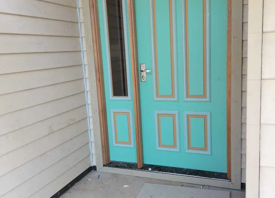 Timber-framed entry door and exterior cladding, a Seaforth Builders project on the Gold Coast